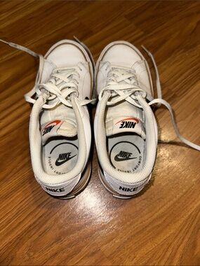 Nike Kids White Sneakers with Orange Logo Accent